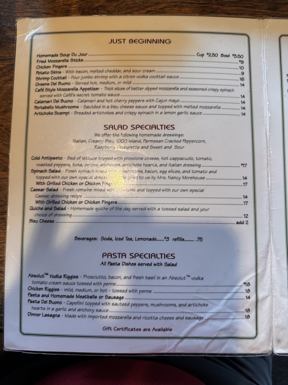 Restaurant menu page with Italian specialties.