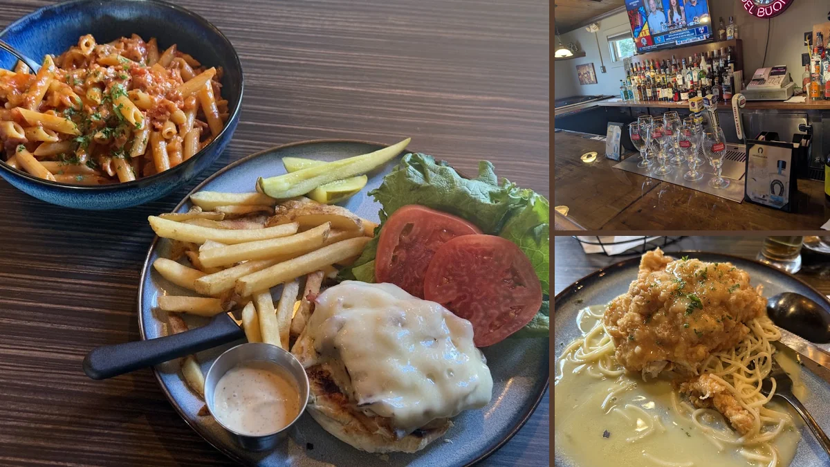 A spread of pasta, salads, and sandwiches.